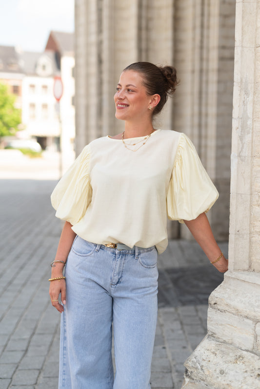Gele blouse met pofmouw