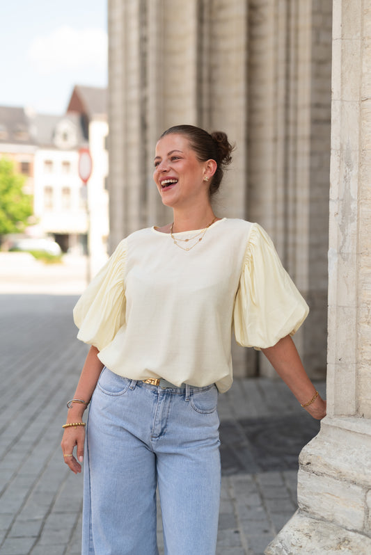 Gele blouse met pofmouw